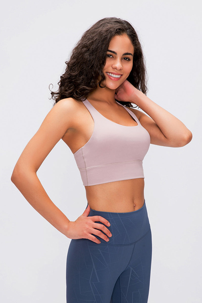 Mauve sports bra with scoop neckline and wide shoulder straps