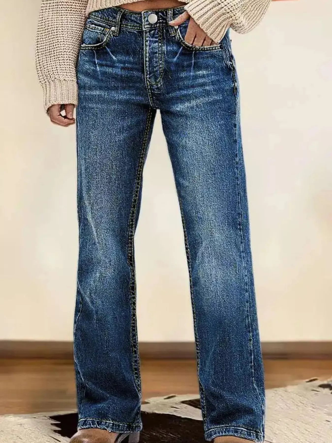 Dark blue vintage wash straight-leg jeans, button fly, five-pocket style.