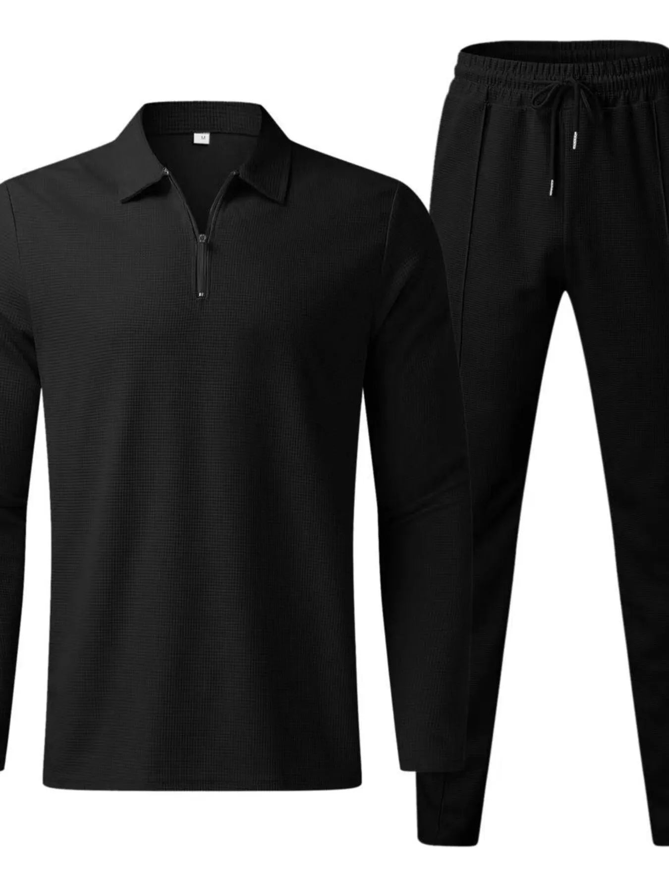 Black long-sleeve quarter-zip top with matching jogger pants set
