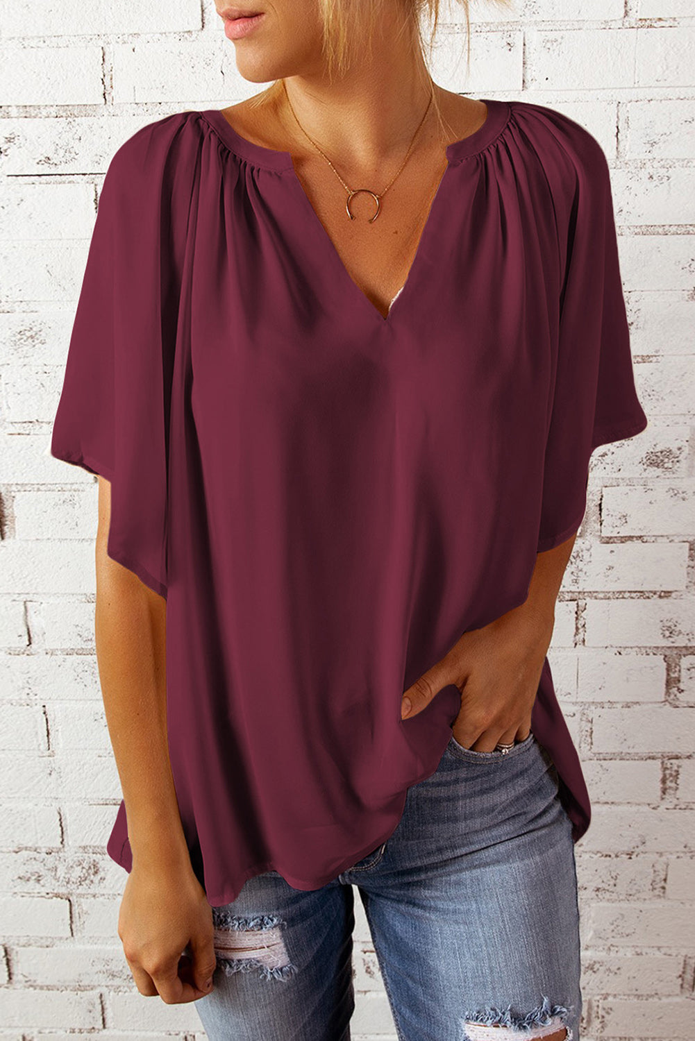 Wine gathered flutter sleeve top with notched neckline and V-style opening