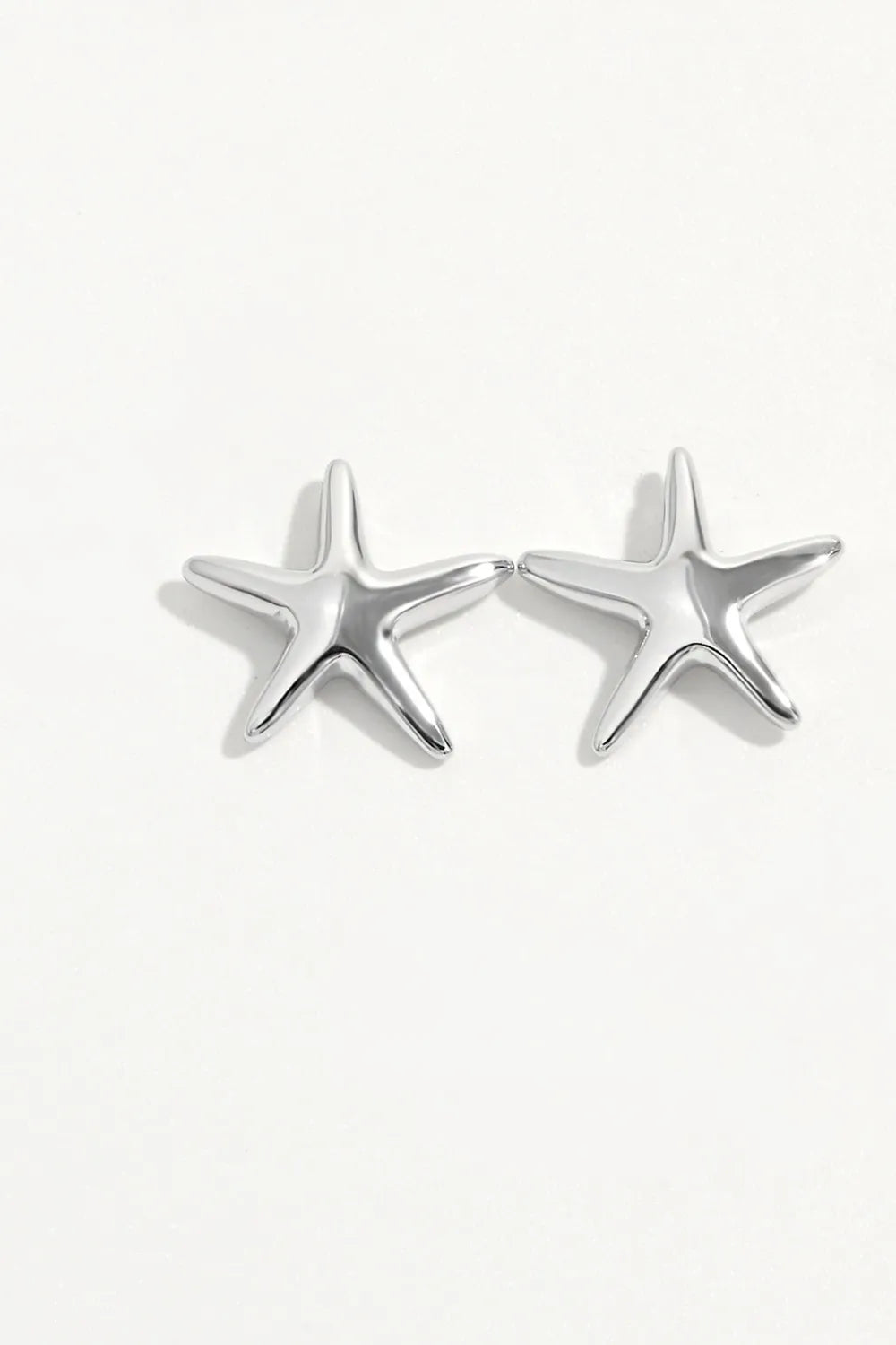 Sterling silver star stud earrings, pair side-by-side