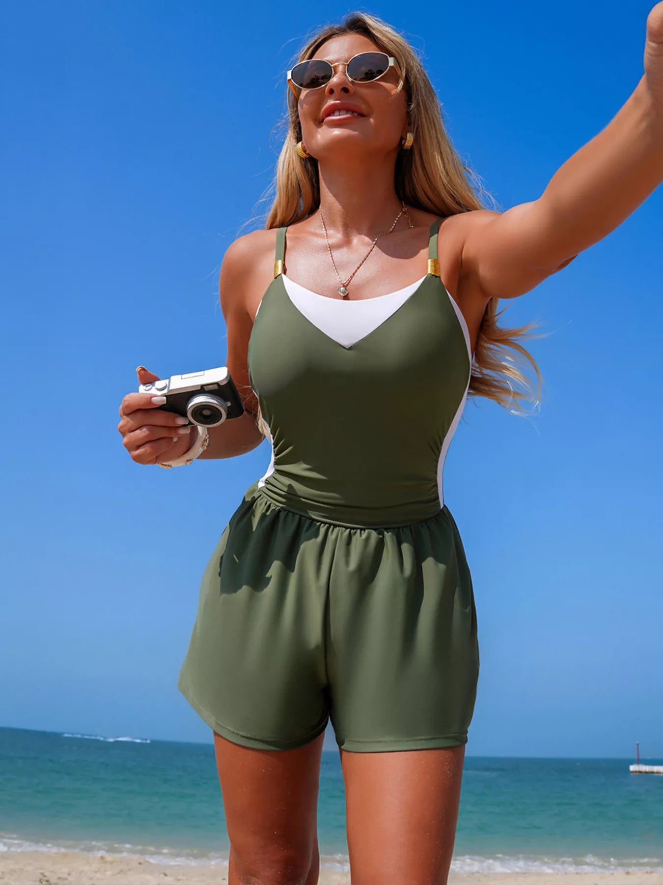 Color block adjustable-strap one-piece swimsuit in olive green with white chest panel and pocketed chest
