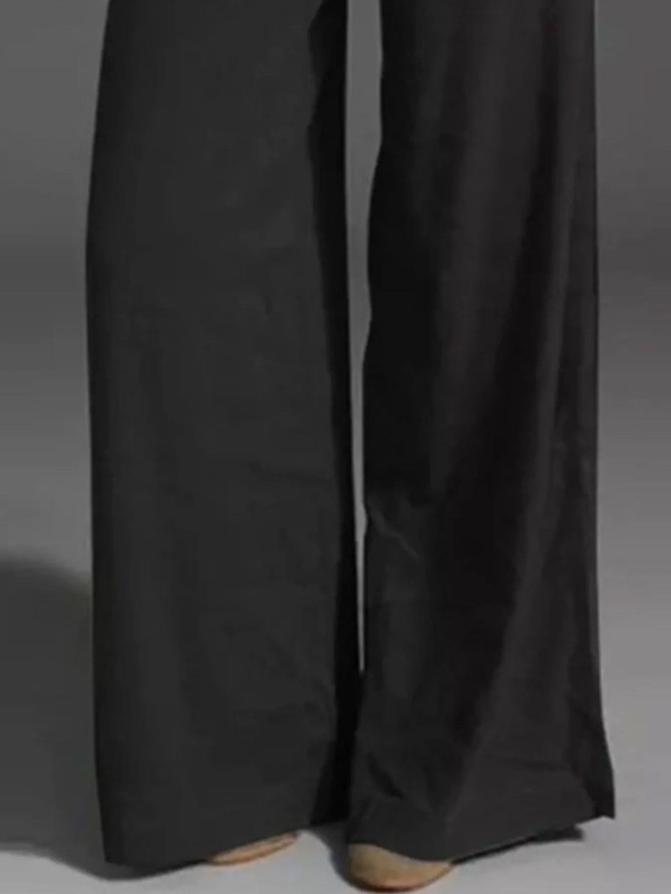 Black wide-leg pants with relaxed wide leg and front seam details