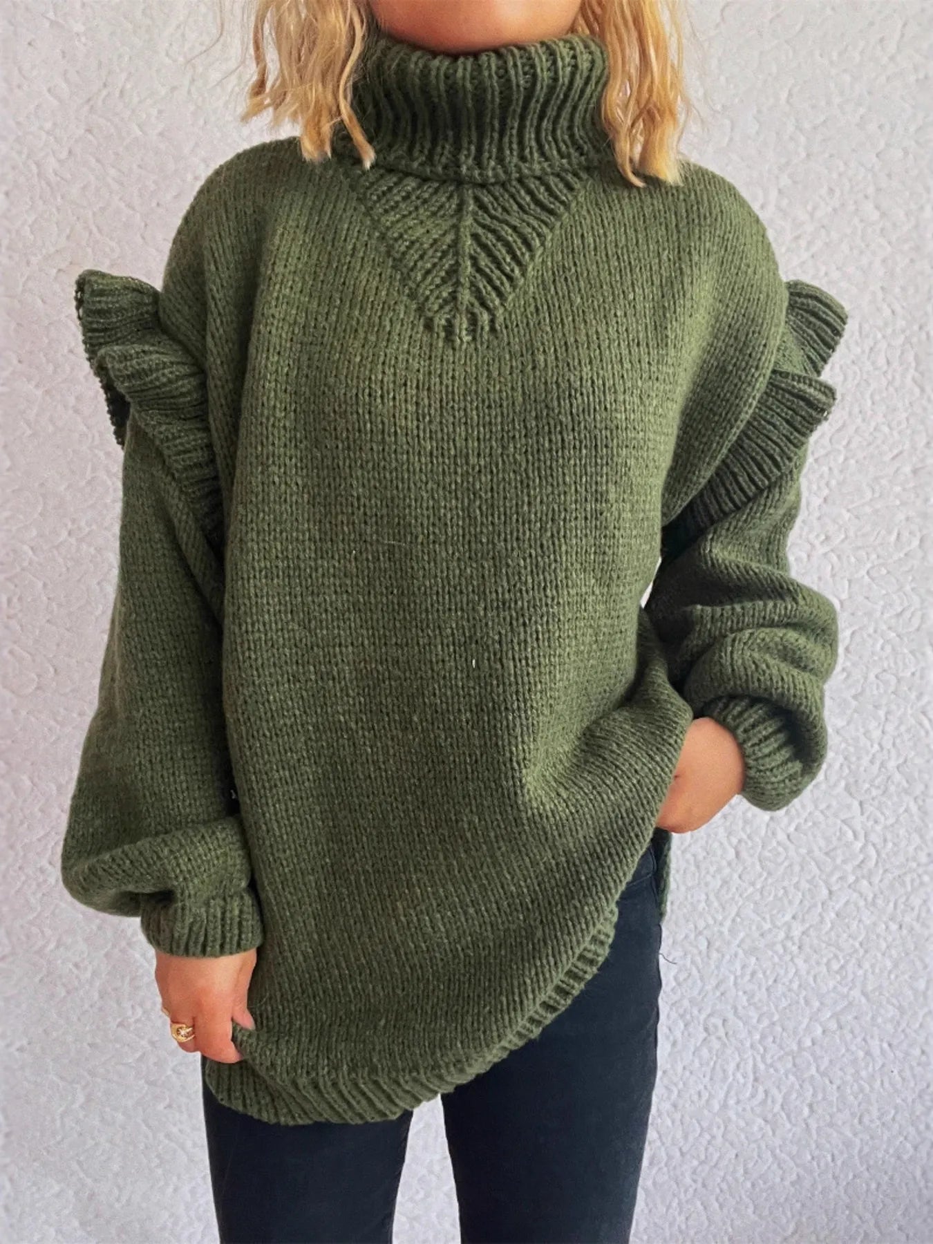 Ruffled turtleneck knit sweater, dark green, front view with shoulder ruffle detail
