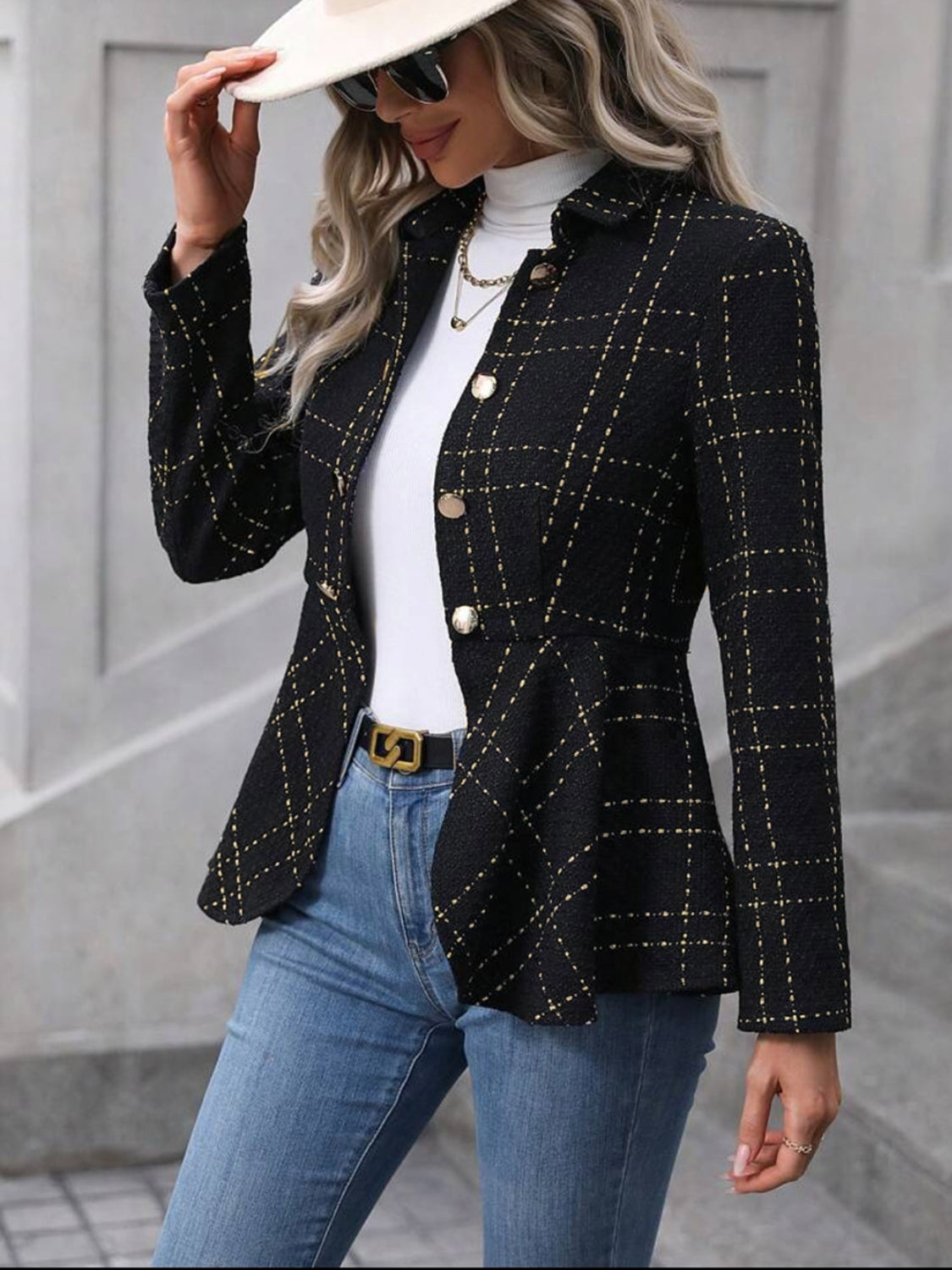 Black collared blazer with ruffle hem and gold buttons, plaid grid seam accents