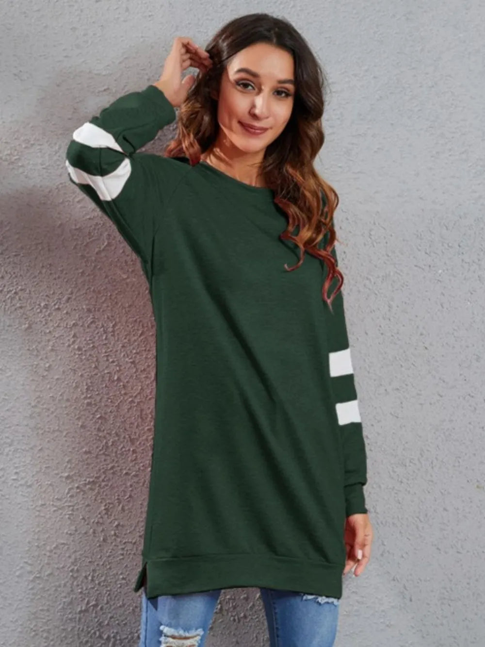 Dark green long-sleeve T-shirt with round neck and white striped cuffs and hem