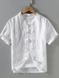 White button-up short-sleeve shirt with band collar and front buttons