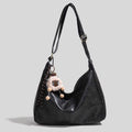 Vintage Style Hobo Shoulder Bag in black PU leather with plush lion charm.