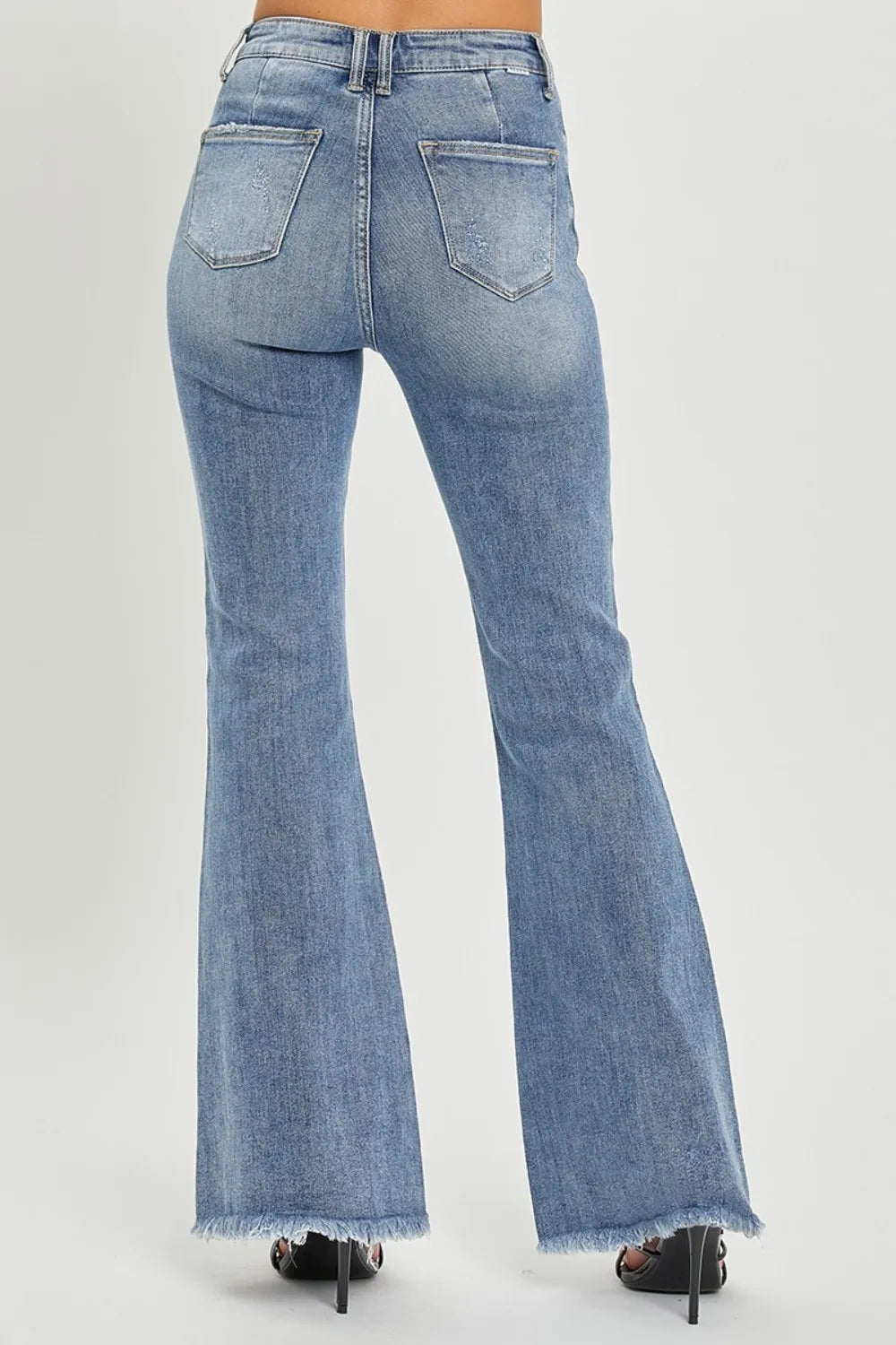 High-waist flare jeans, raw hem, medium blue wash, back patch pockets