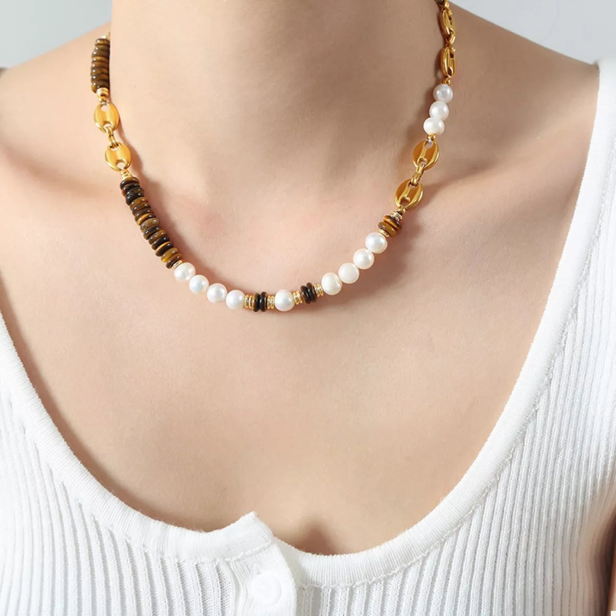 Gold bead necklace with freshwater pearls, tiger eye and dark bead accents