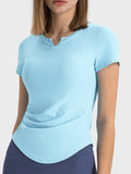 Pastel blue active t-shirt with notched V-neck and short sleeves