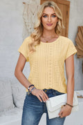 Light yellow eyelet short-sleeve T-shirt with round neck and rolled sleeves