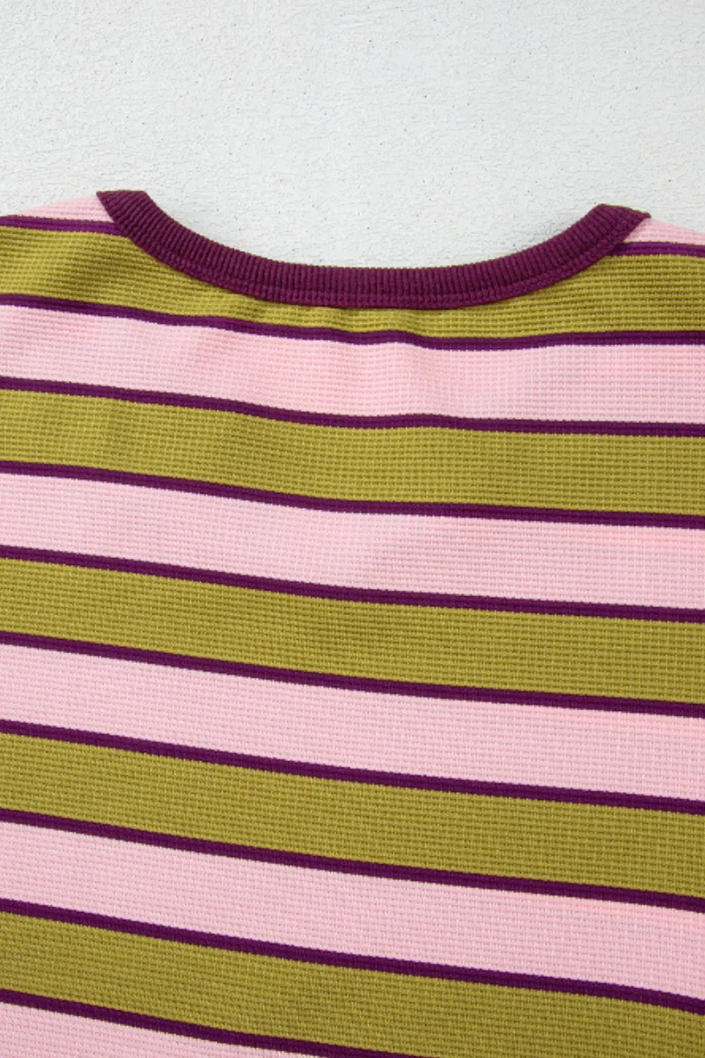Striped crew neckline with purple trim, pink and green and purple horizontal stripes