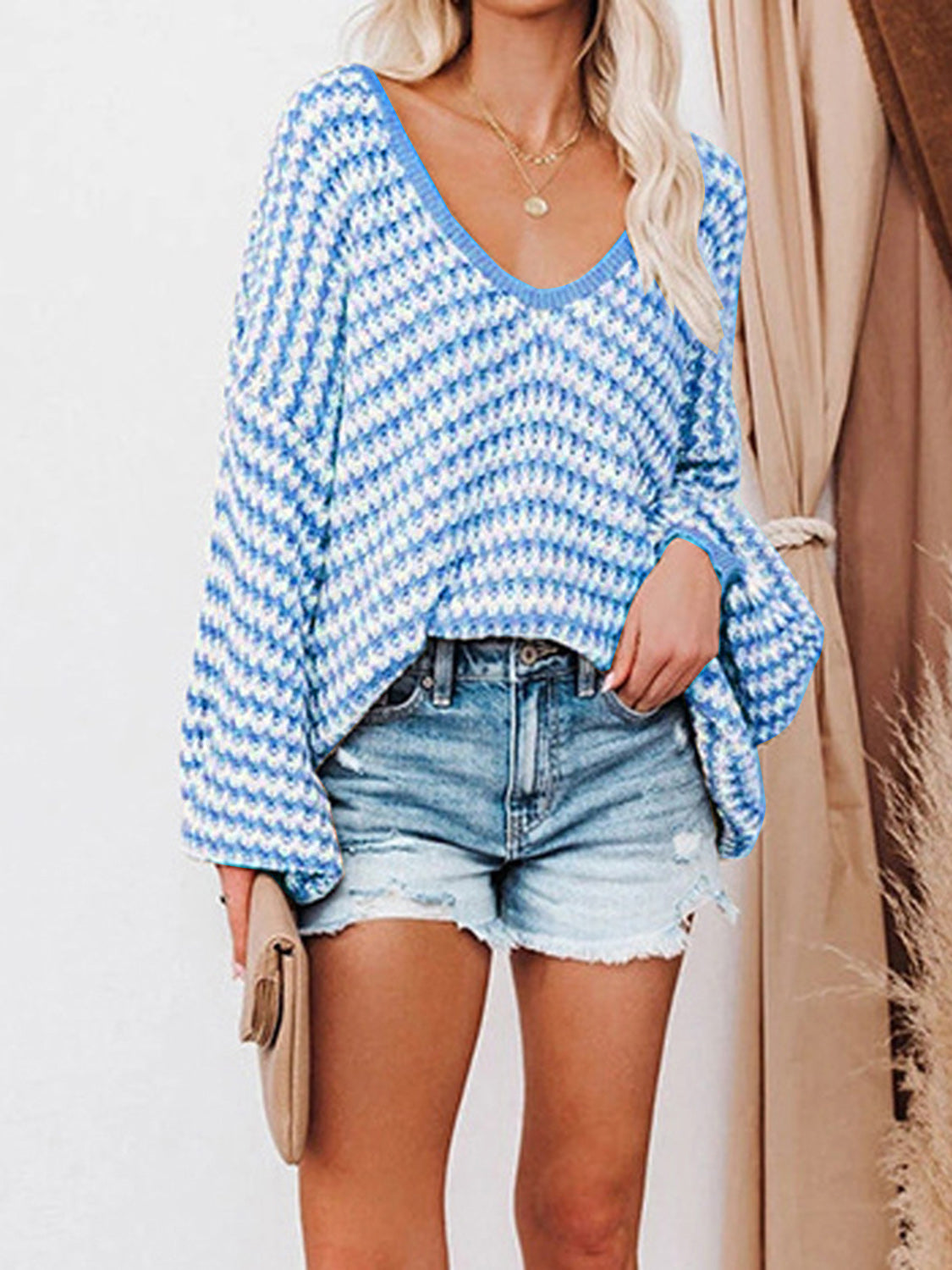 Striped drop-shoulder V-neck sweater, sky blue with white knit stripes and long sleeves