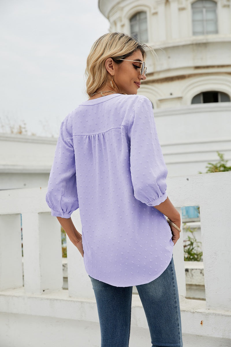 Lavender swiss dot notched-neck blouse with 3/4 sleeves, back view