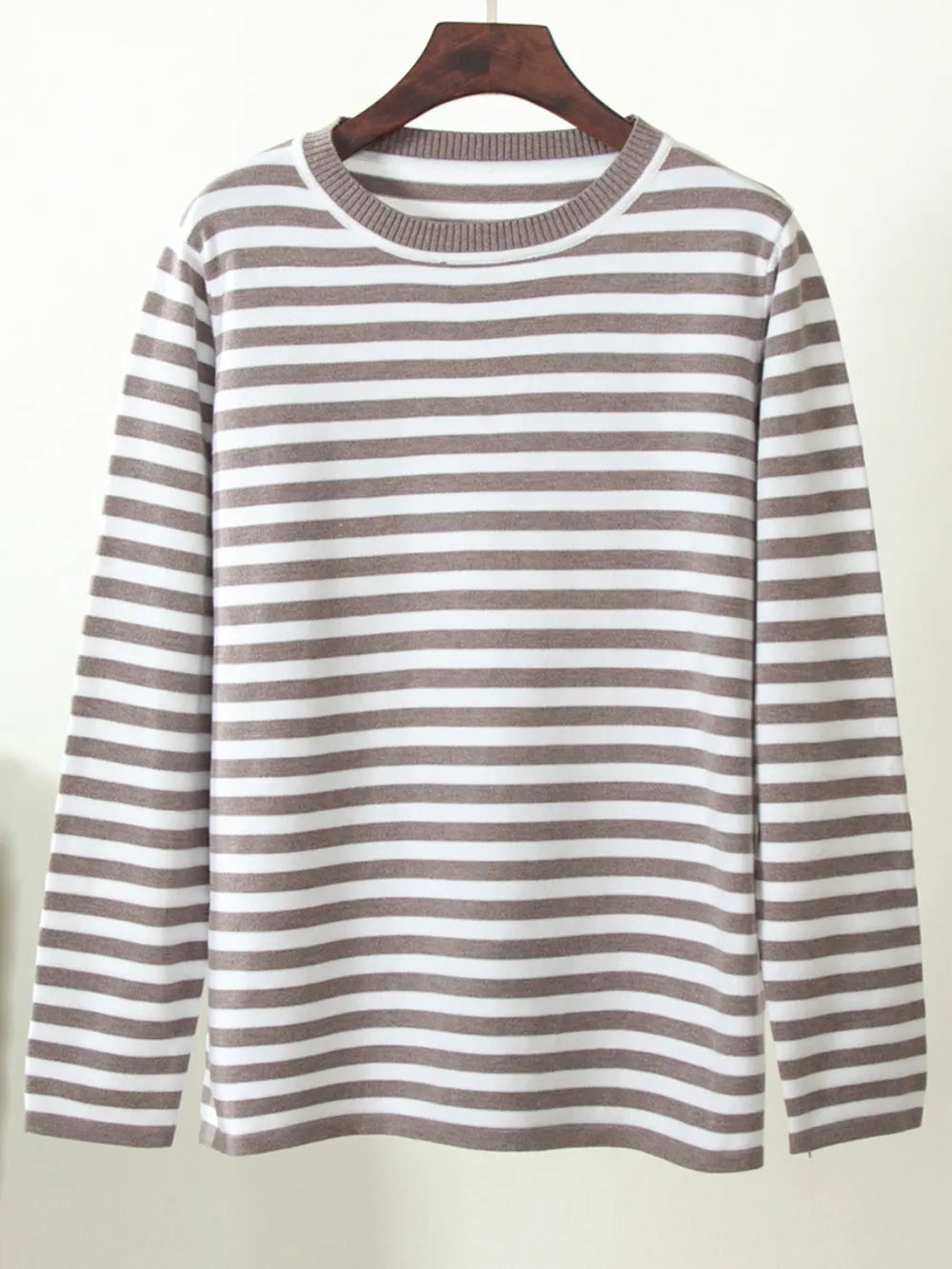 Striped long-sleeve sweater with round neck, mocha and white horizontal stripes.