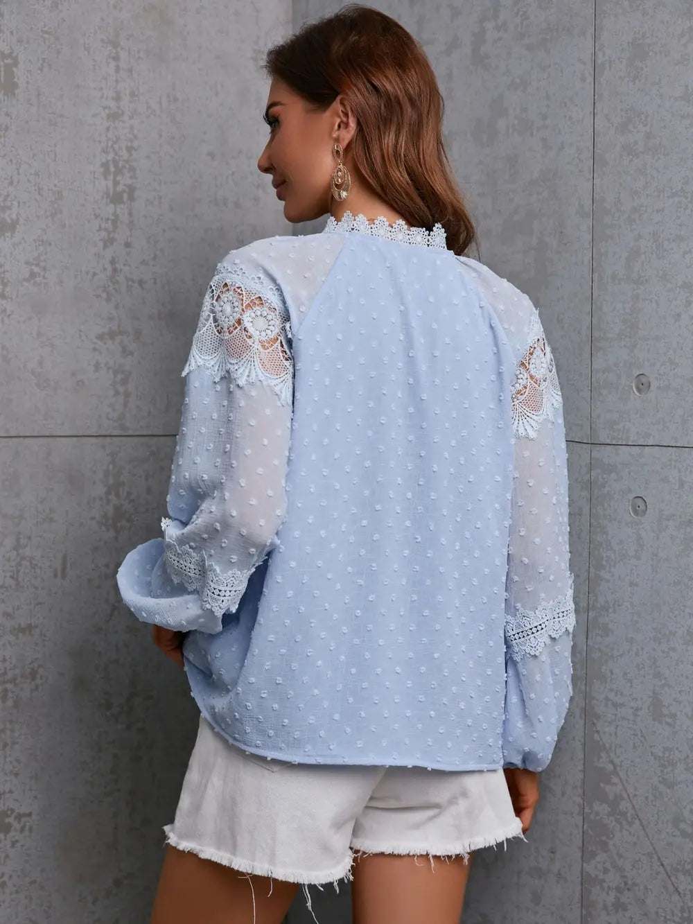 Light blue long-sleeve blouse with crochet lace sleeves and back yoke