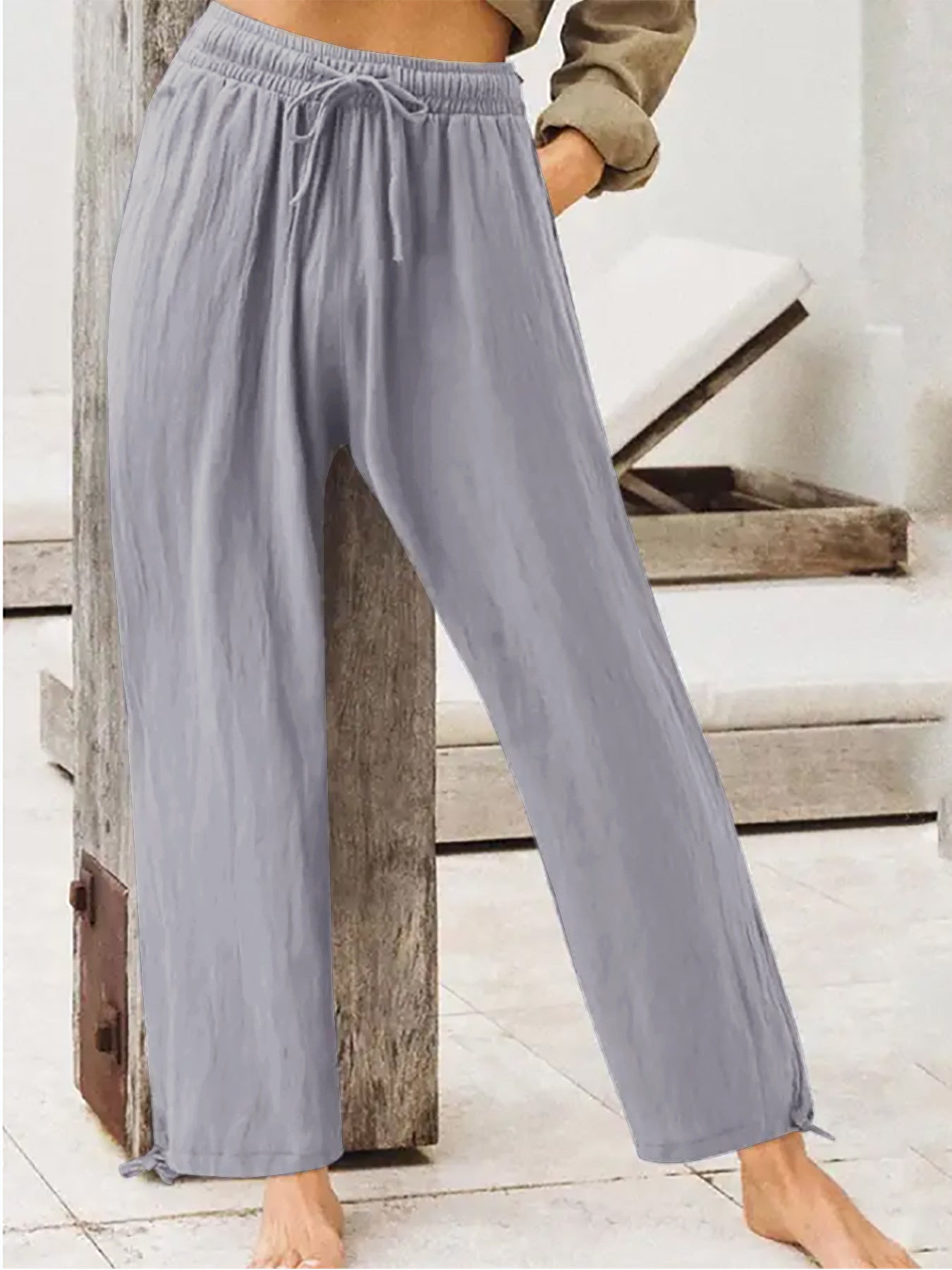 Women's wide-leg drawstring pants in light periwinkle blue, elastic waist, relaxed fit.