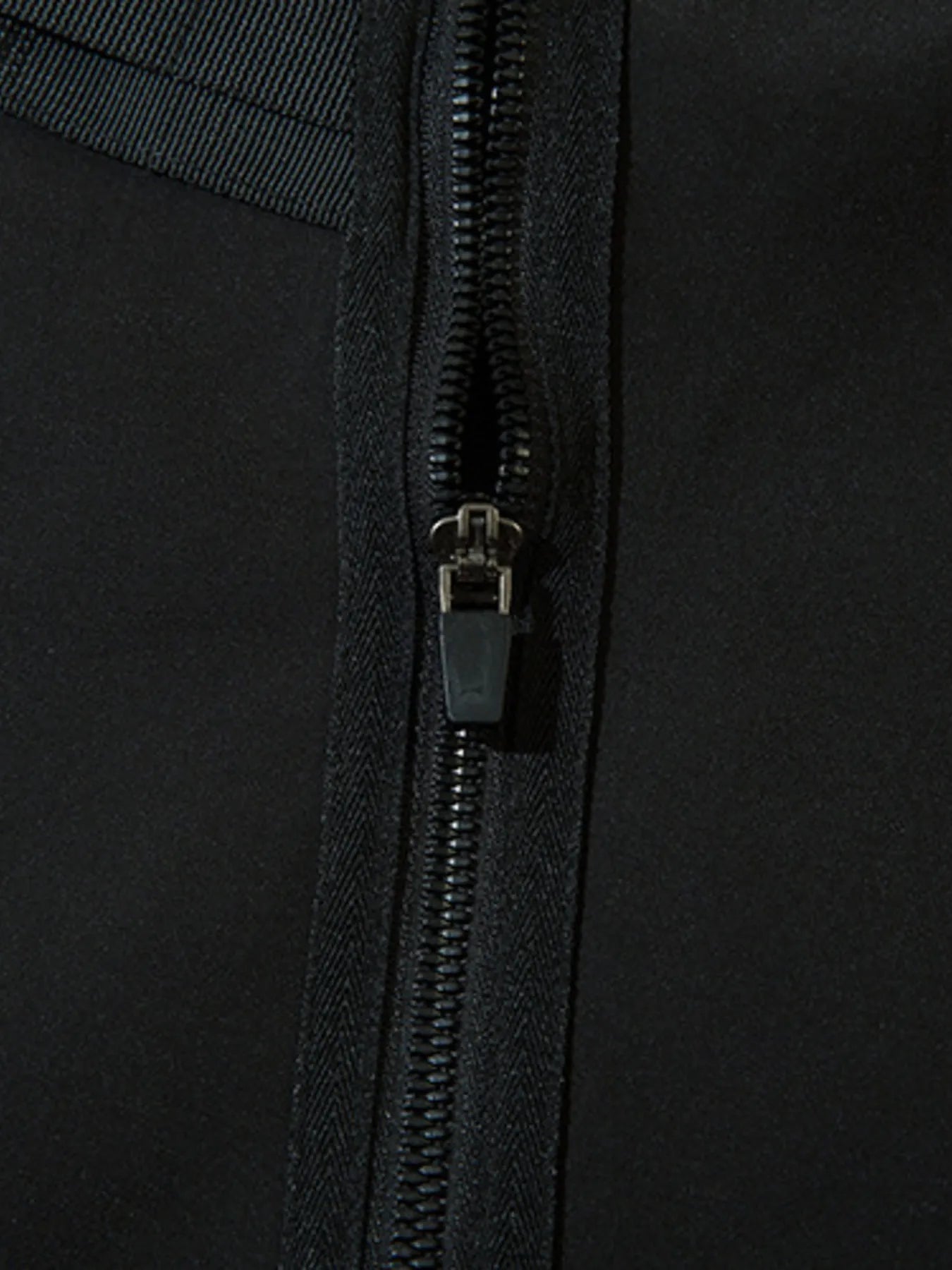 Black cargo joggers with zippered front fly and smooth metal zipper pull
