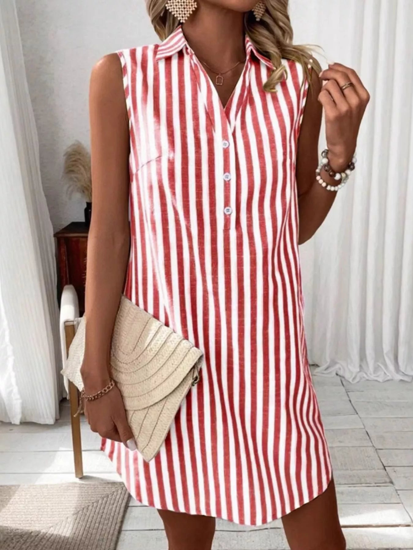 Sleeveless striped shirt dress with button front, red and white vertical stripes