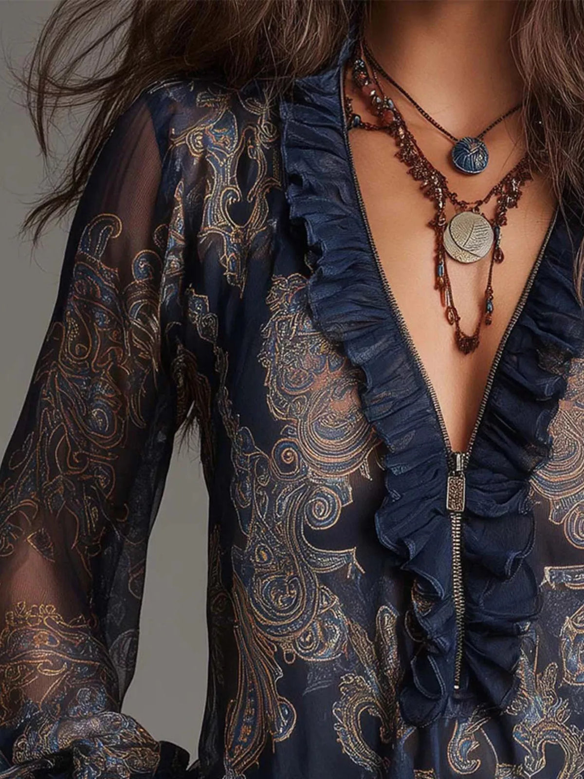 Navy blue paisley ruffle zip-front blouse with deep V and ruffled front placket