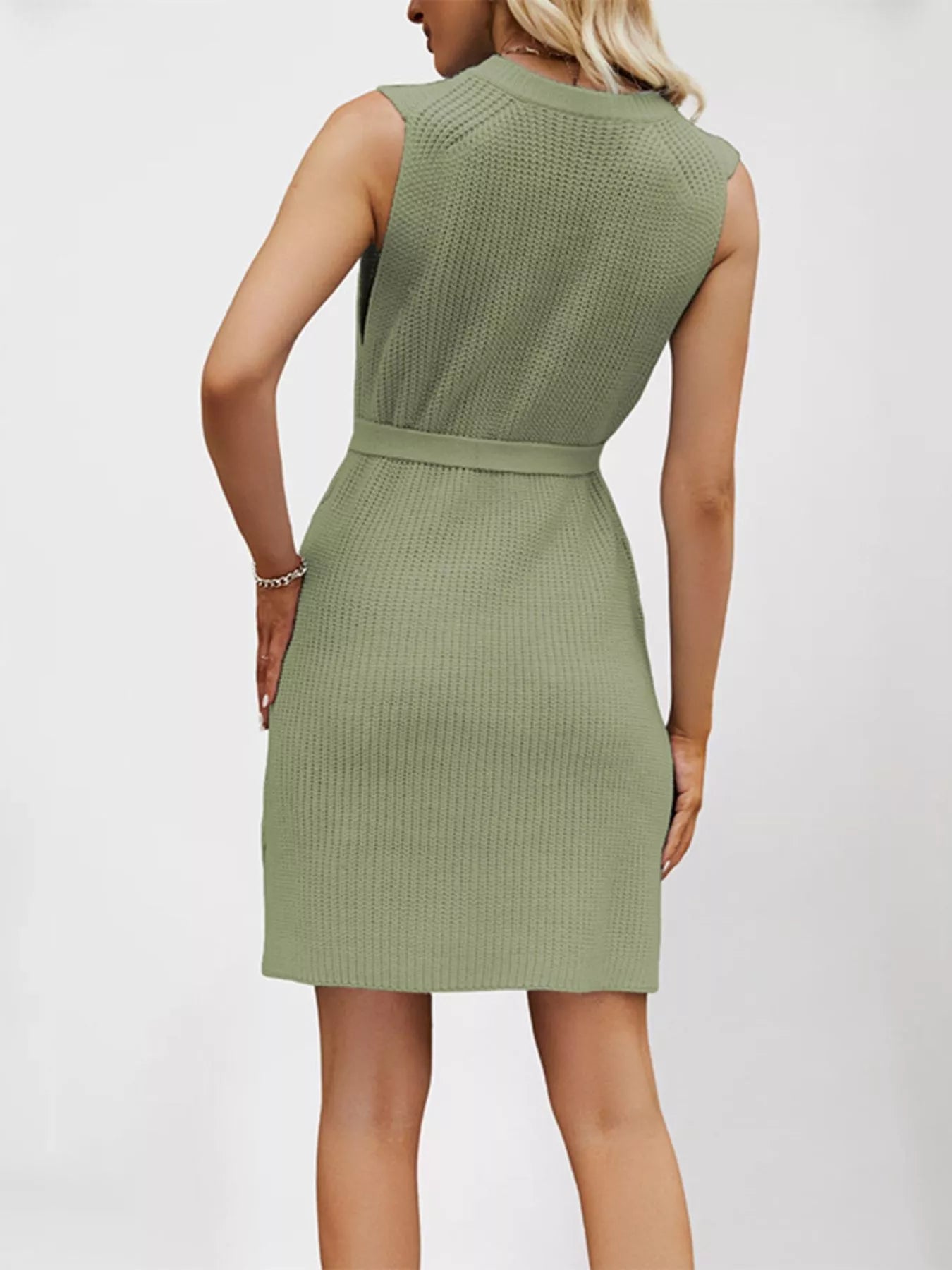 Green waffle-knit sleeveless mini dress with back view and waist belt detail
