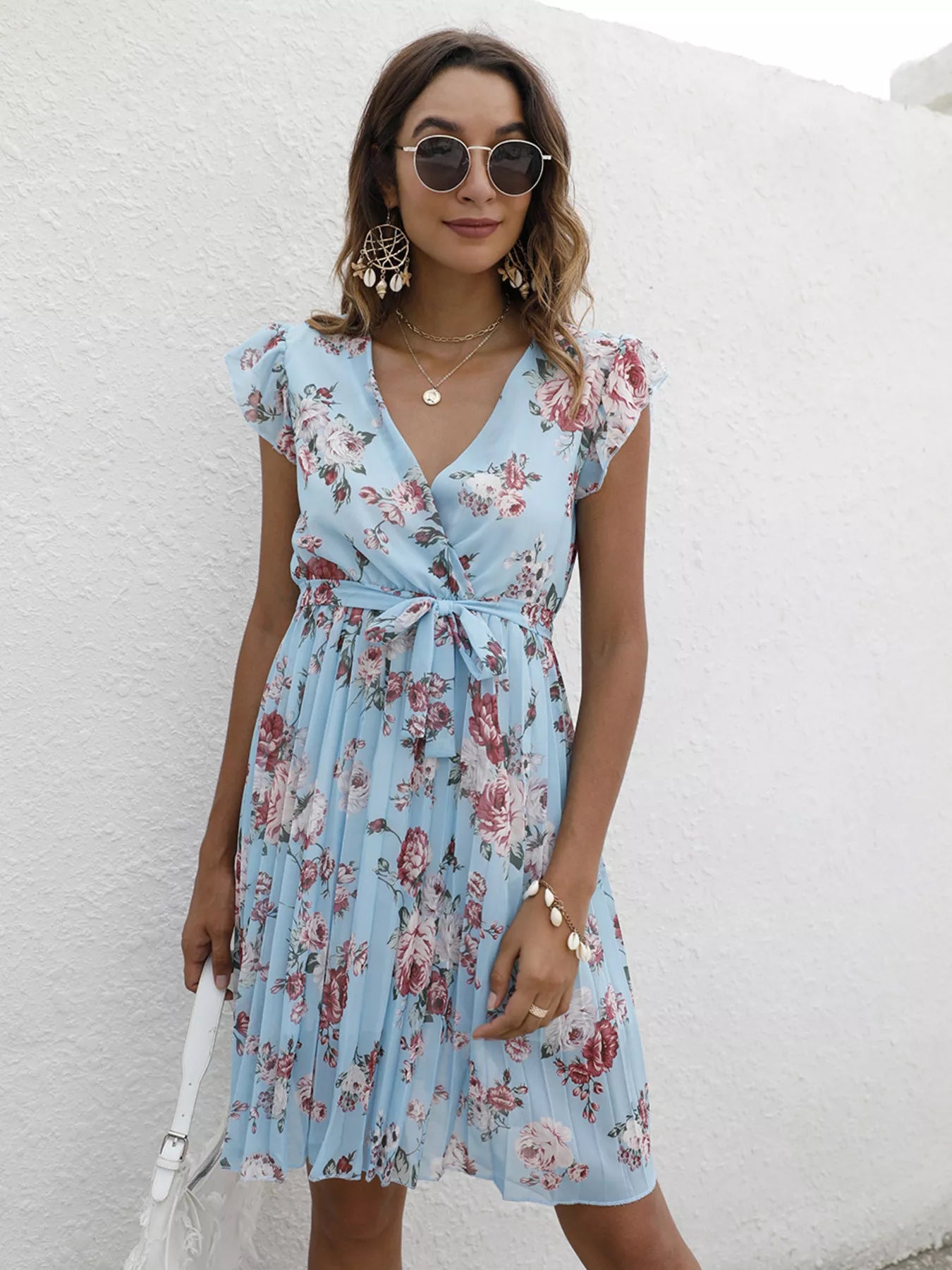 Light blue pleated floral ruffle-sleeve dress with V-neck and tie waist