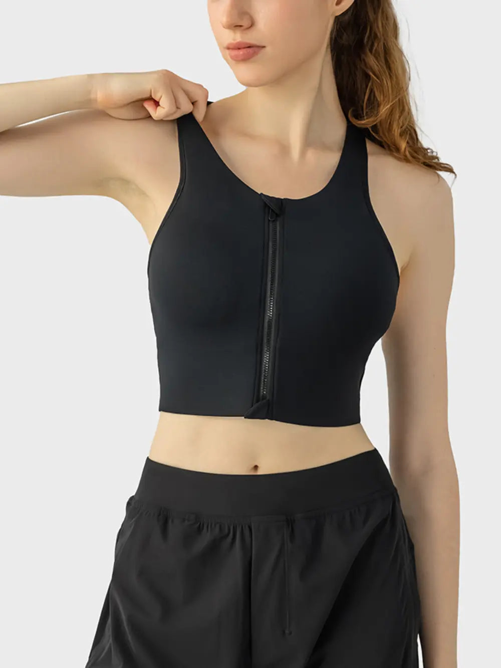 Black wide-strap sport bra with full-length front zipper and racerback