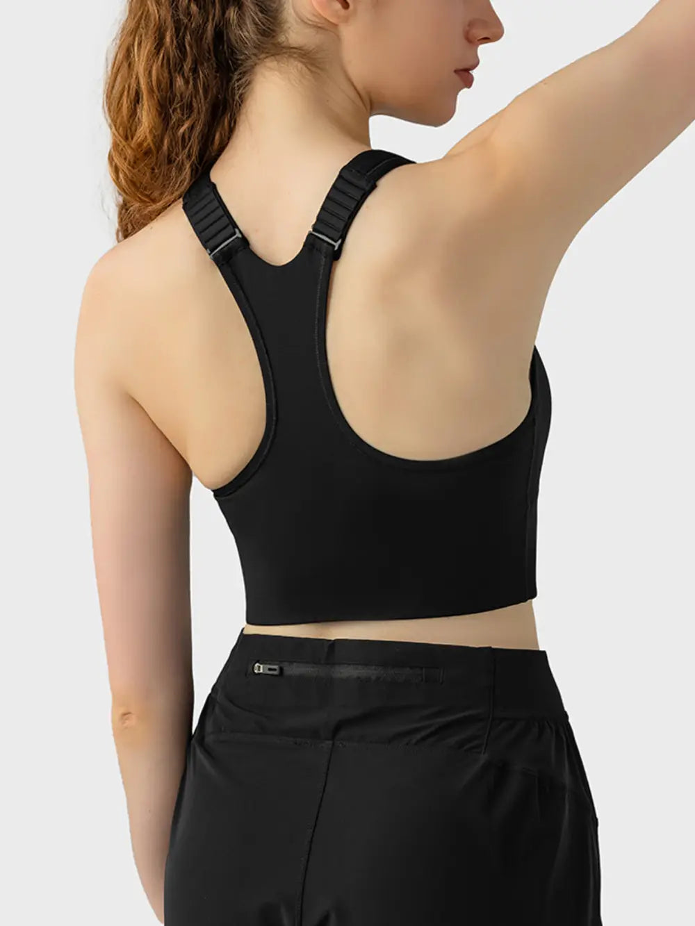 Wide-strap sport bra with racerback design, black fabric