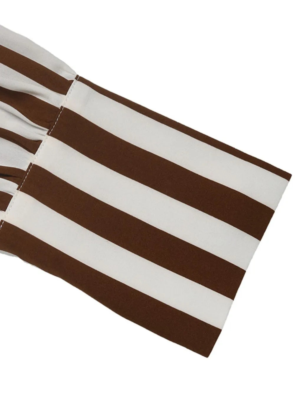 Brown and white striped blouse fabric with long sleeve seam and panel stitching