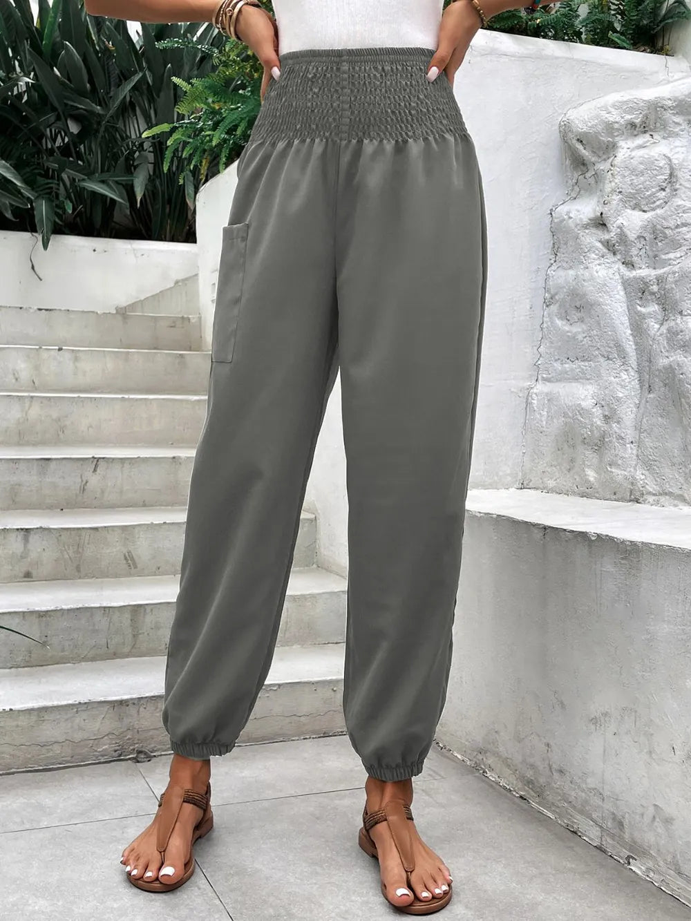 Smocked high-rise joggers with side pockets, gray with elastic cuffs