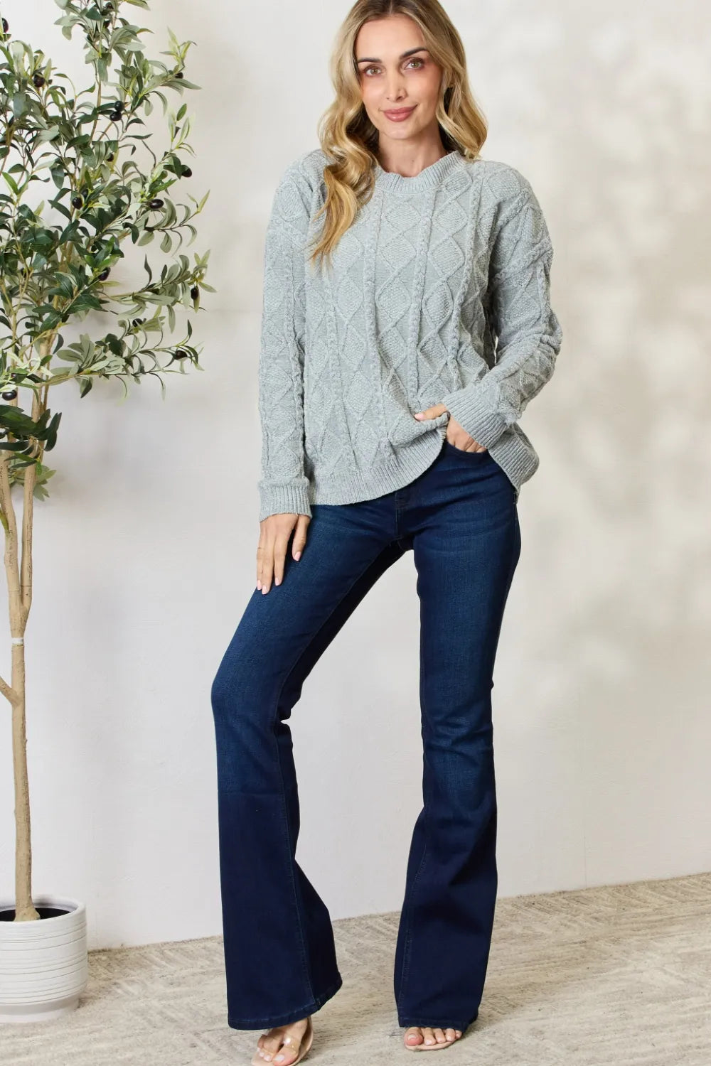Dust sage cable knit round-neck sweater with long sleeves and ribbed finishing