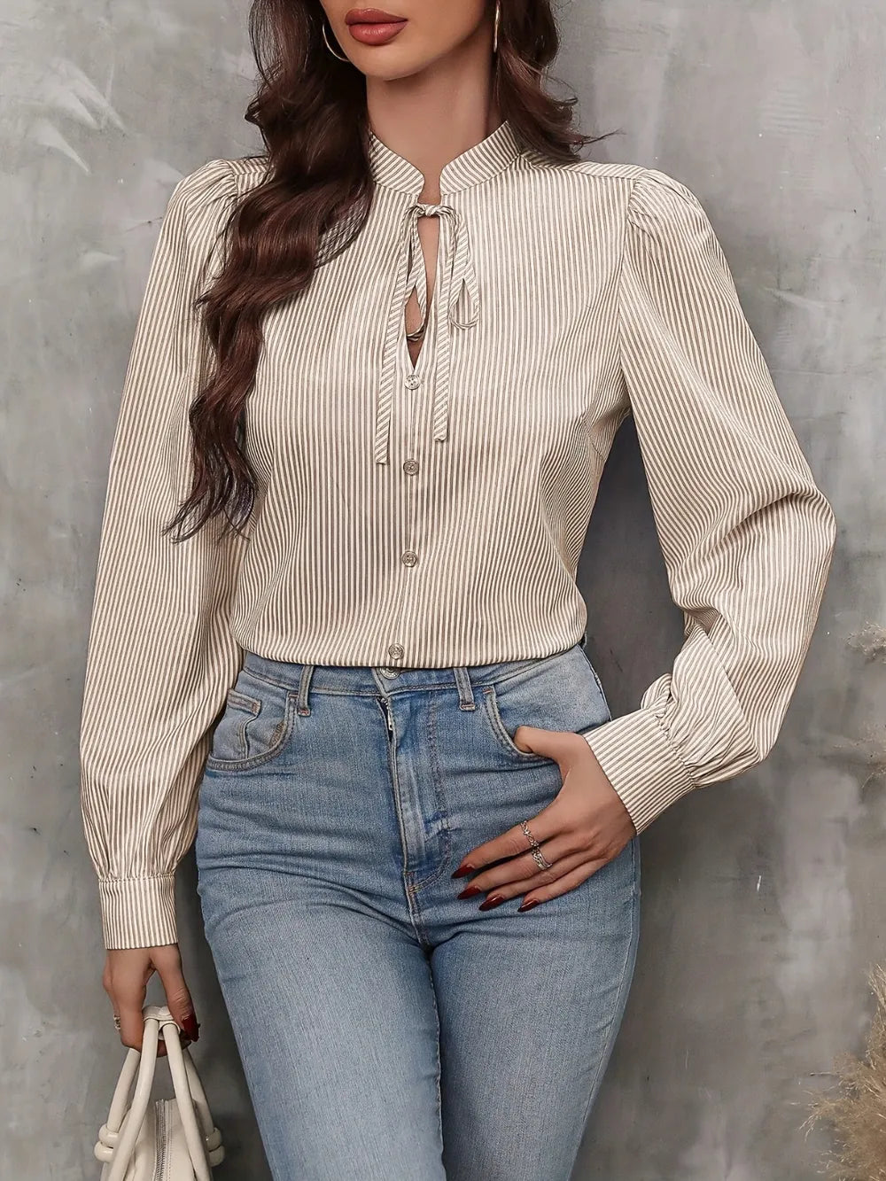 Taupe striped long sleeve blouse with tied keyhole neckline and button-front