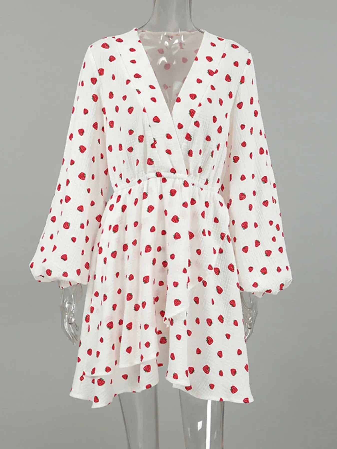 White strawberry-print long-sleeve mini dress with wrap V-neck and elastic waist