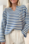 Blue and white striped long-sleeve top, chest pocket, V-neck button placket