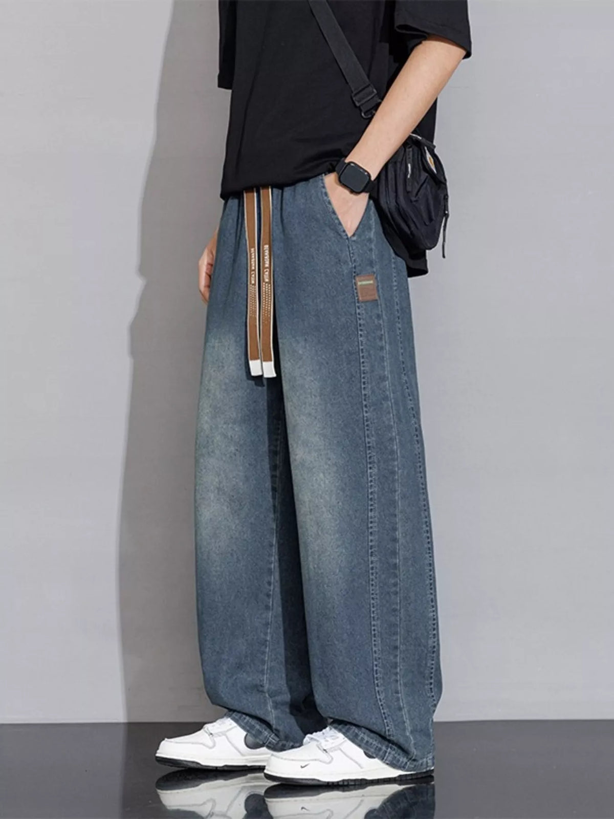 Men's vintage-wash gray-blue wide-leg drawstring jeans, full side view