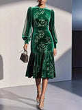 Green velvet floral midi dress with lantern sleeves and tiered skirt
