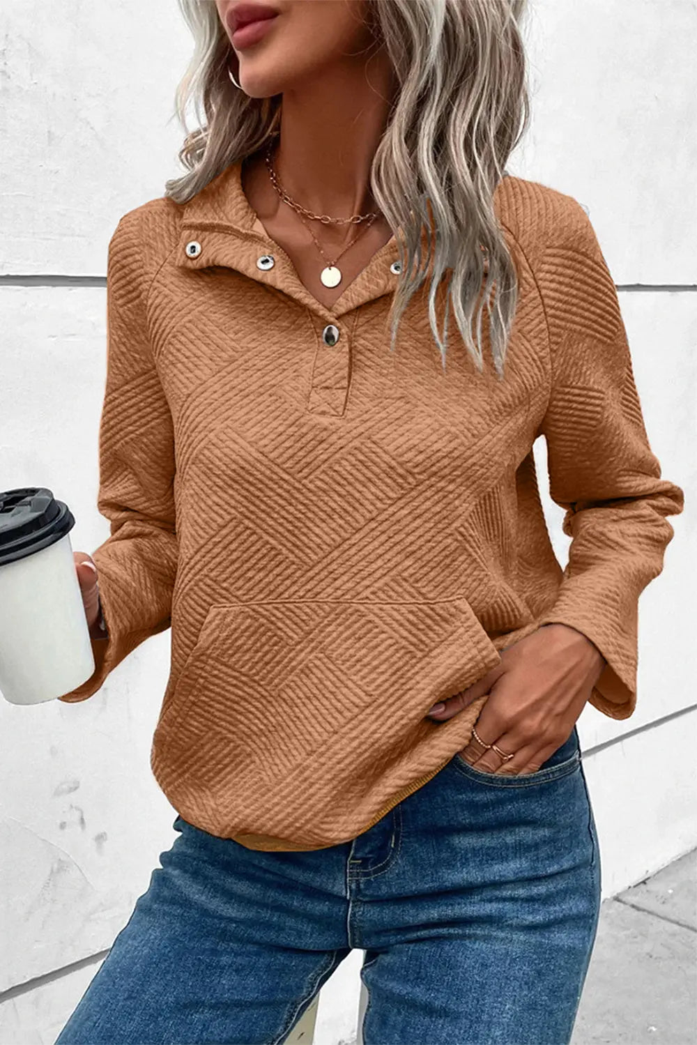 Caramel brown snap-button long-sleeve sweatshirt with diamond-textured geometric pattern