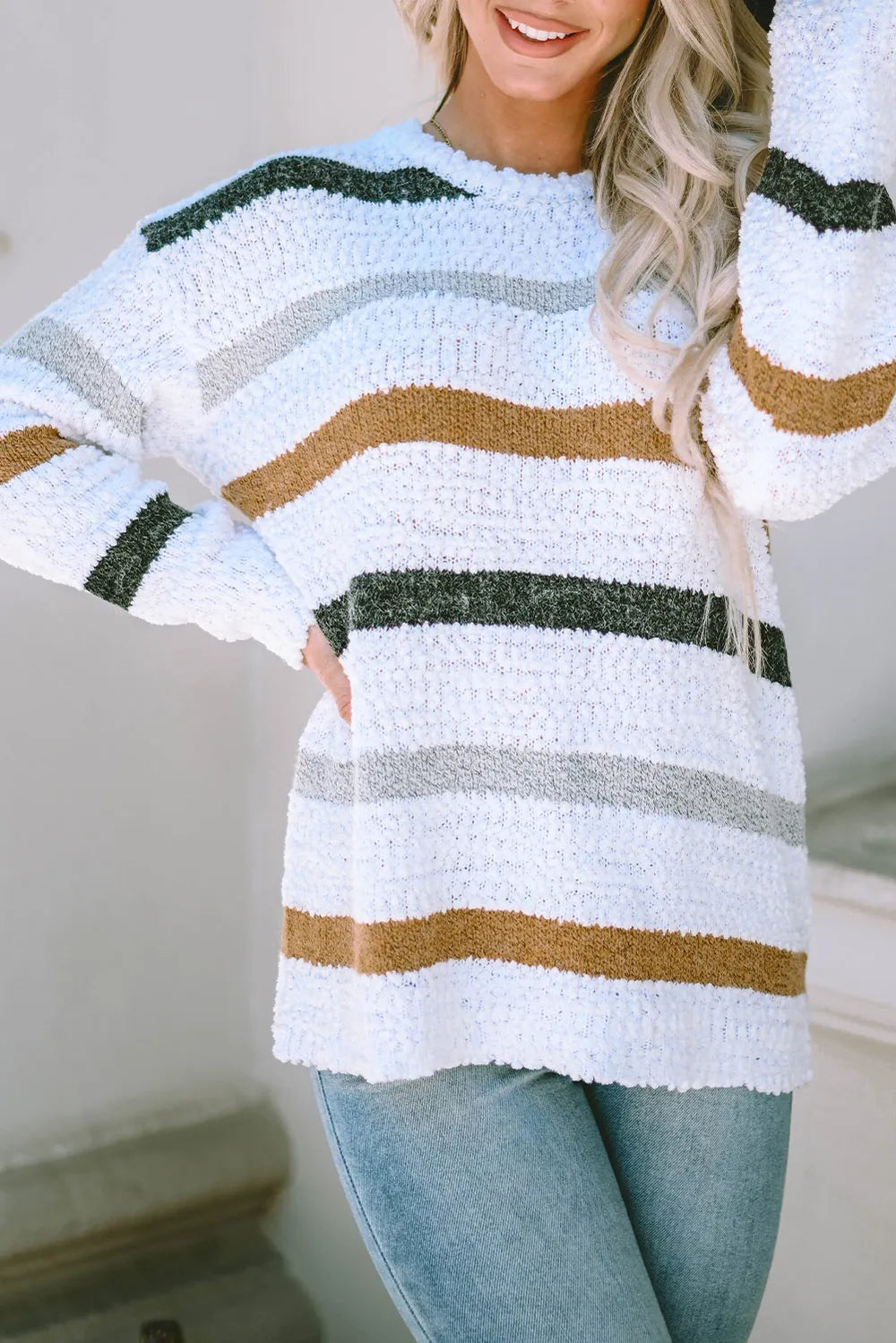 White striped round-neck sweater, dropped-shoulder fit, long sleeves with green, tan bands