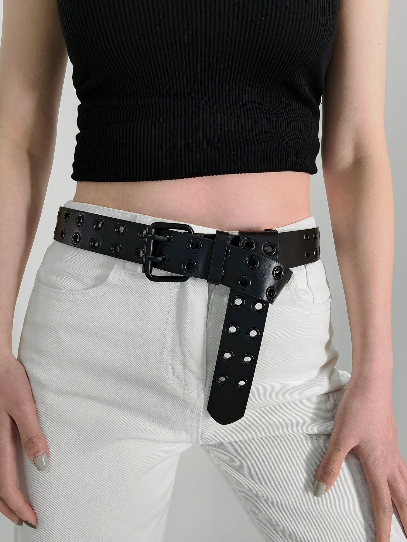 Black vegan leather grommet belt with square buckle and studded strap detail