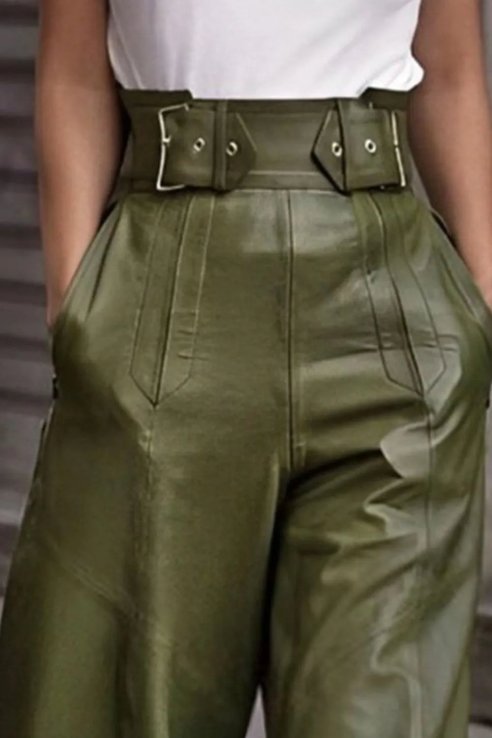 Moss green high-waist wide flare pants with double buckle belt detail