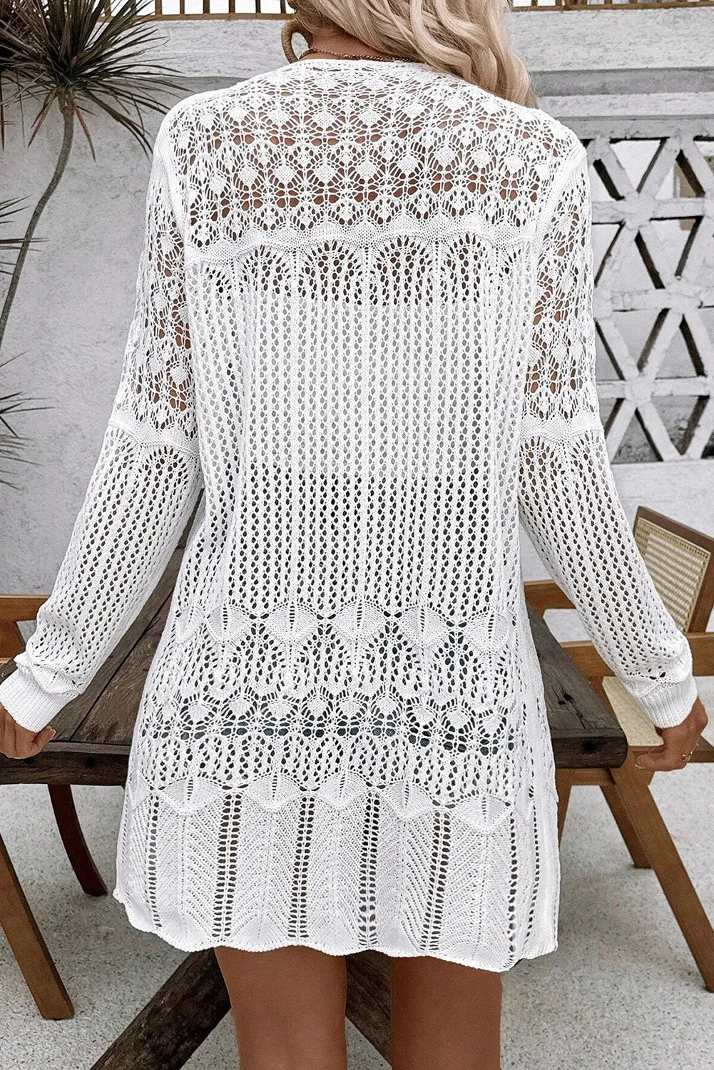 White long-sleeve openwork cardigan with open-back crochet knit and tiered hem