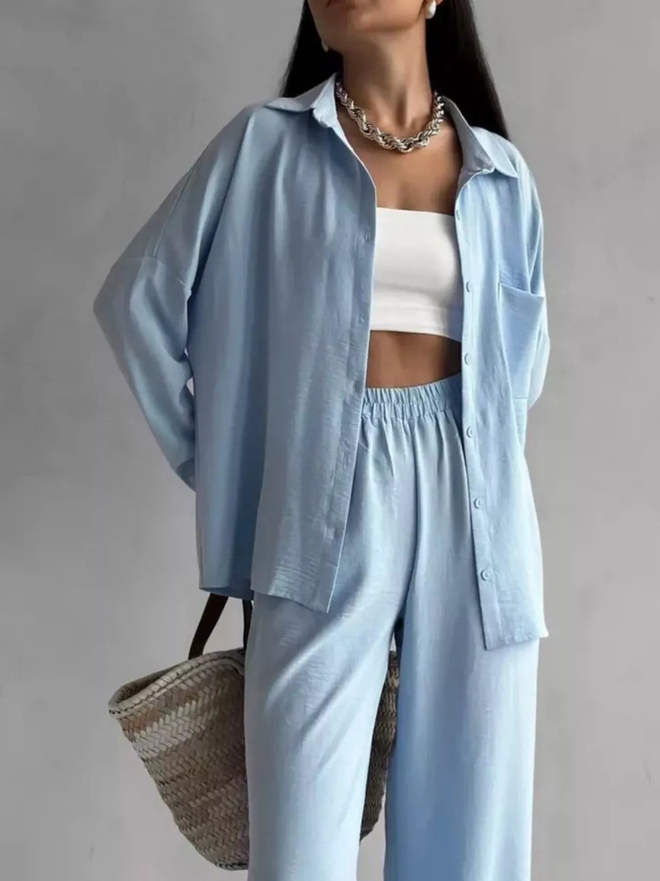 Light blue relaxed-fit shirt and wide-leg pants set with chest pocket and elastic waist