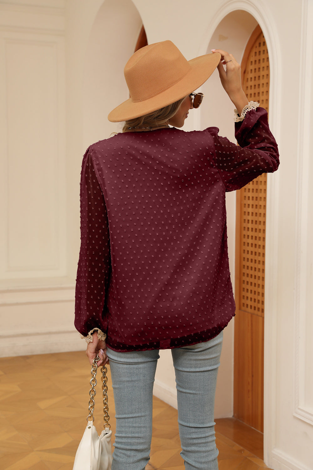Wine Swiss-dot V-neck blouse with contrast trim, long sleeves (back view)