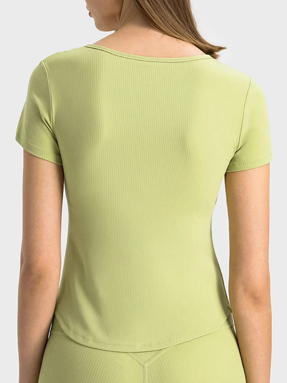 Notched short-sleeve active t-shirt, yellow green back view with curved hem