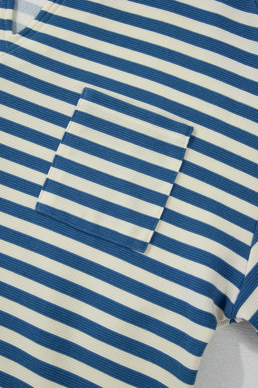 Blue and white striped chest pocket detail with stitched border