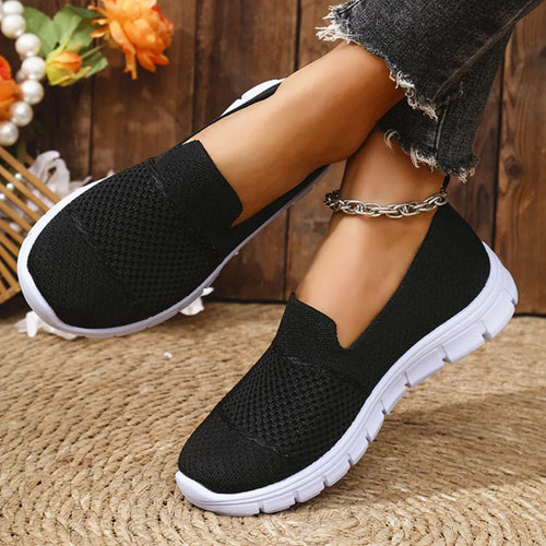 Breathable mesh athletic slip-on shoes in black with white sole
