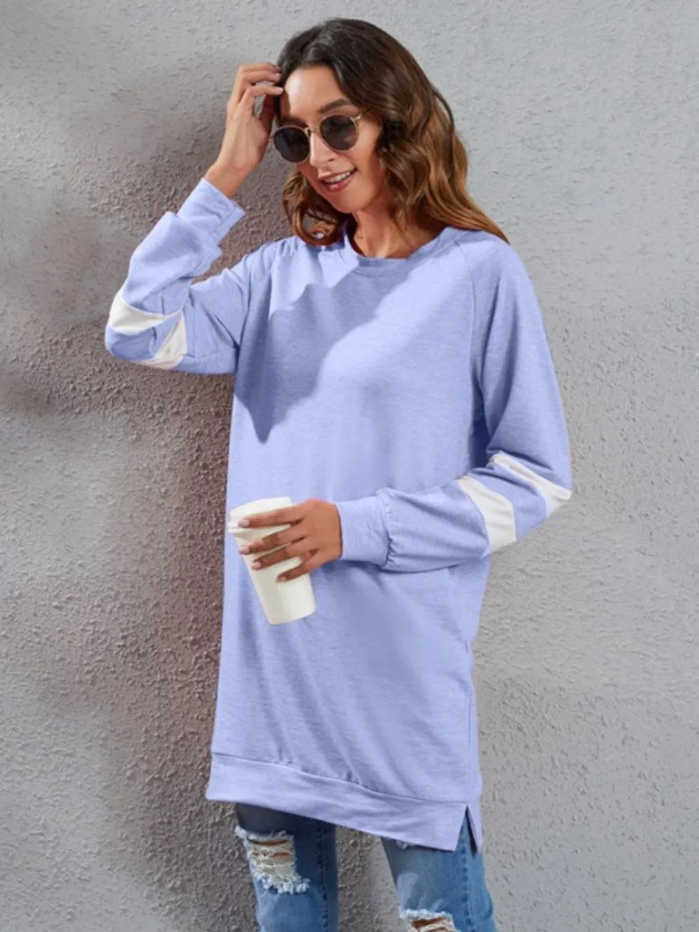 Light blue long-sleeve striped round-neck T-shirt with white cuff and sleeve stripes