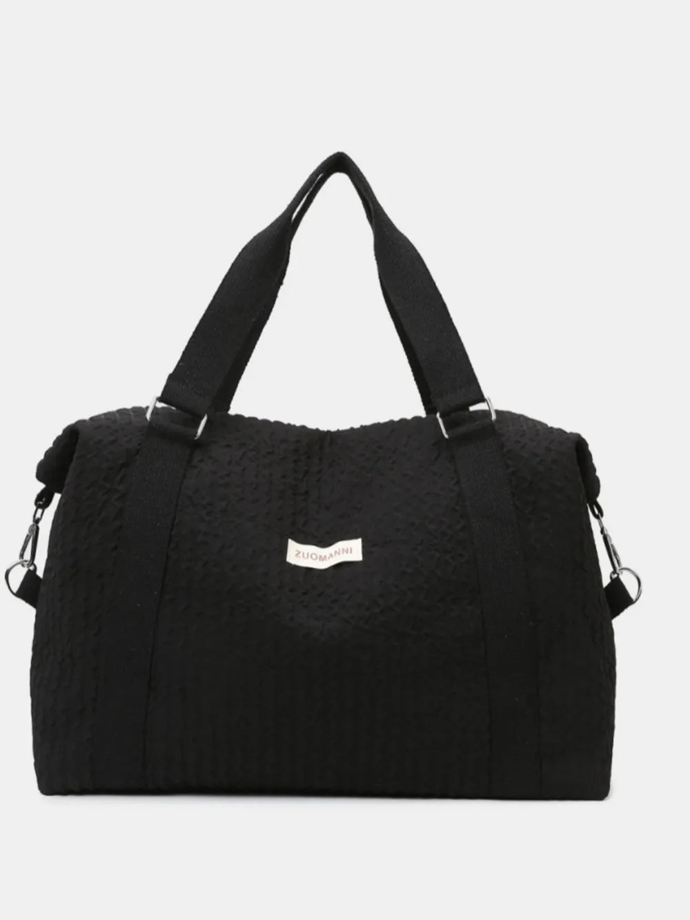 Black textured large duffle travel bag with reinforced handles and side zipper