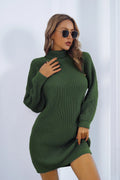 Green knit turtleneck sweater dress with long sleeves, side buttons and fitted shape